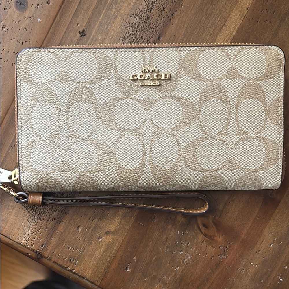 Coach Tan Signature Bags with Iconic Pattern and Gold Hardware